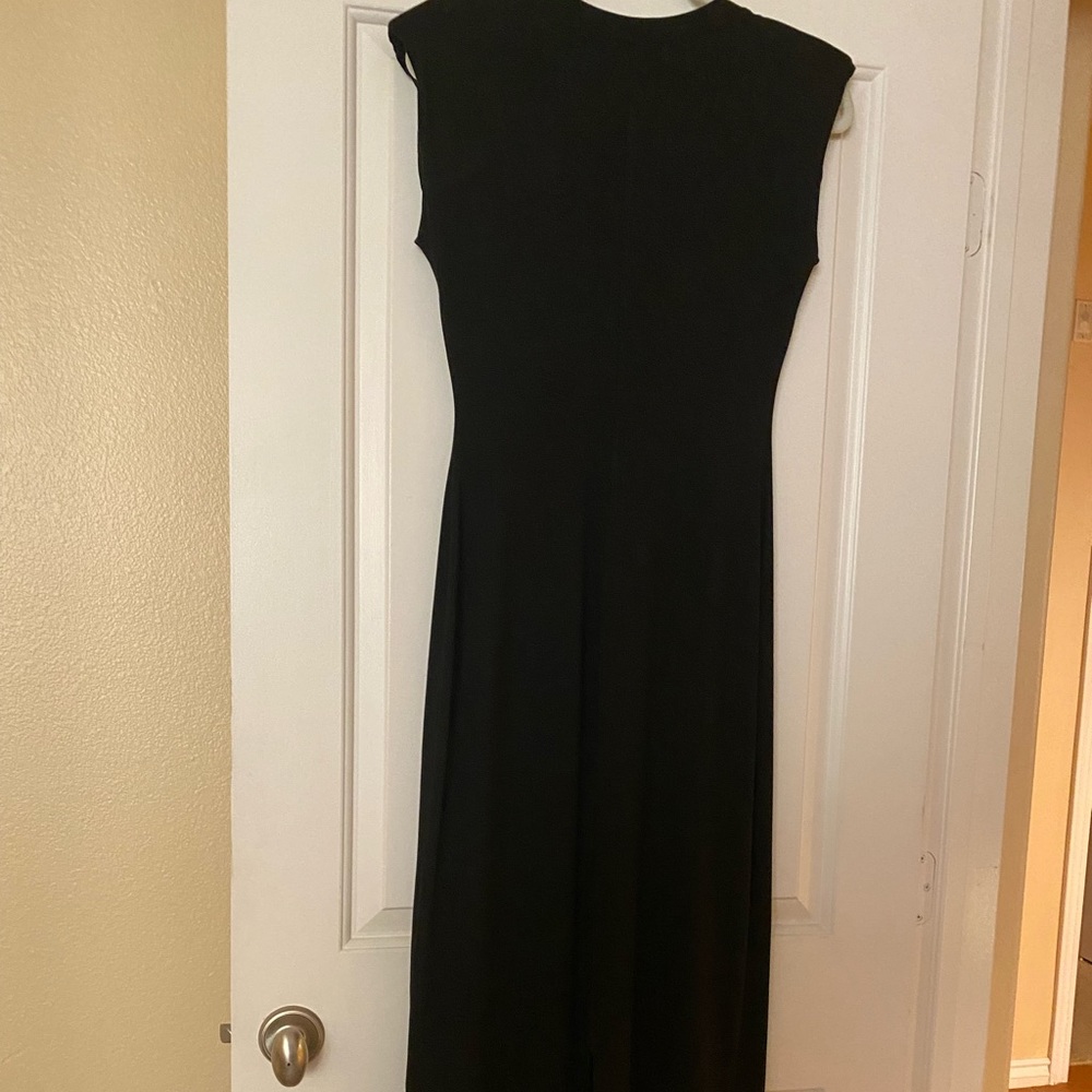 Black dress with padded shoulders